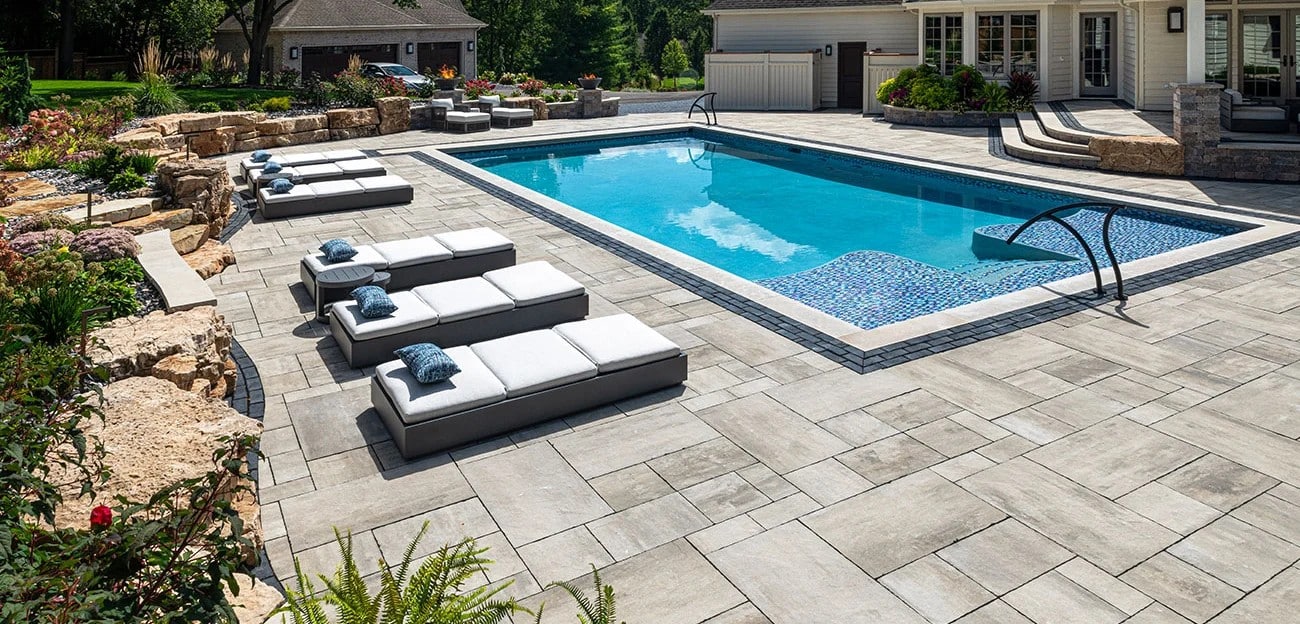 Interlocking paver pool deck installation by Vision Grounds
