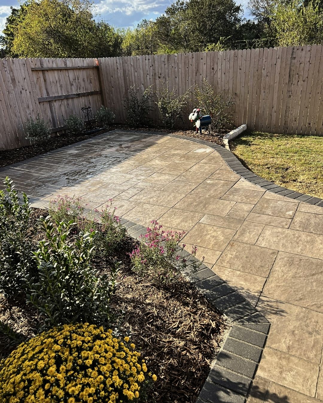 Structural retaining wall with paver patio — Hill Country Texas