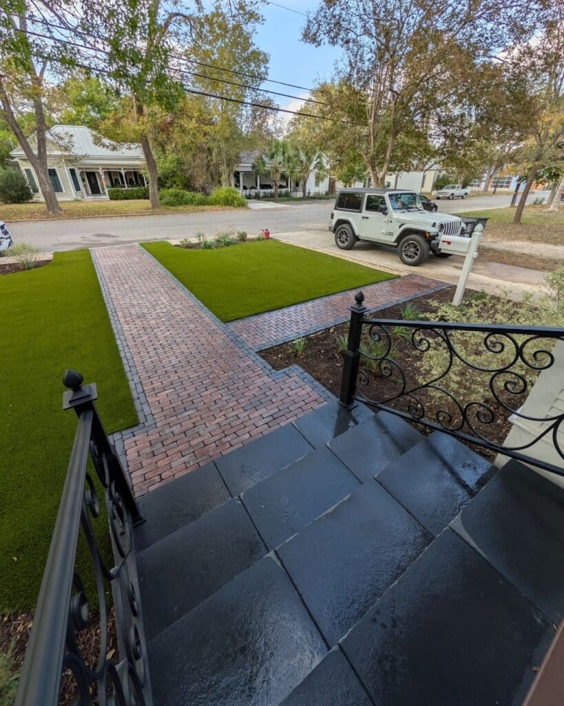 Artisan paver walkway for a 1913 historic home in New Braunfels using Unilock Copthorne in a tri-color blend