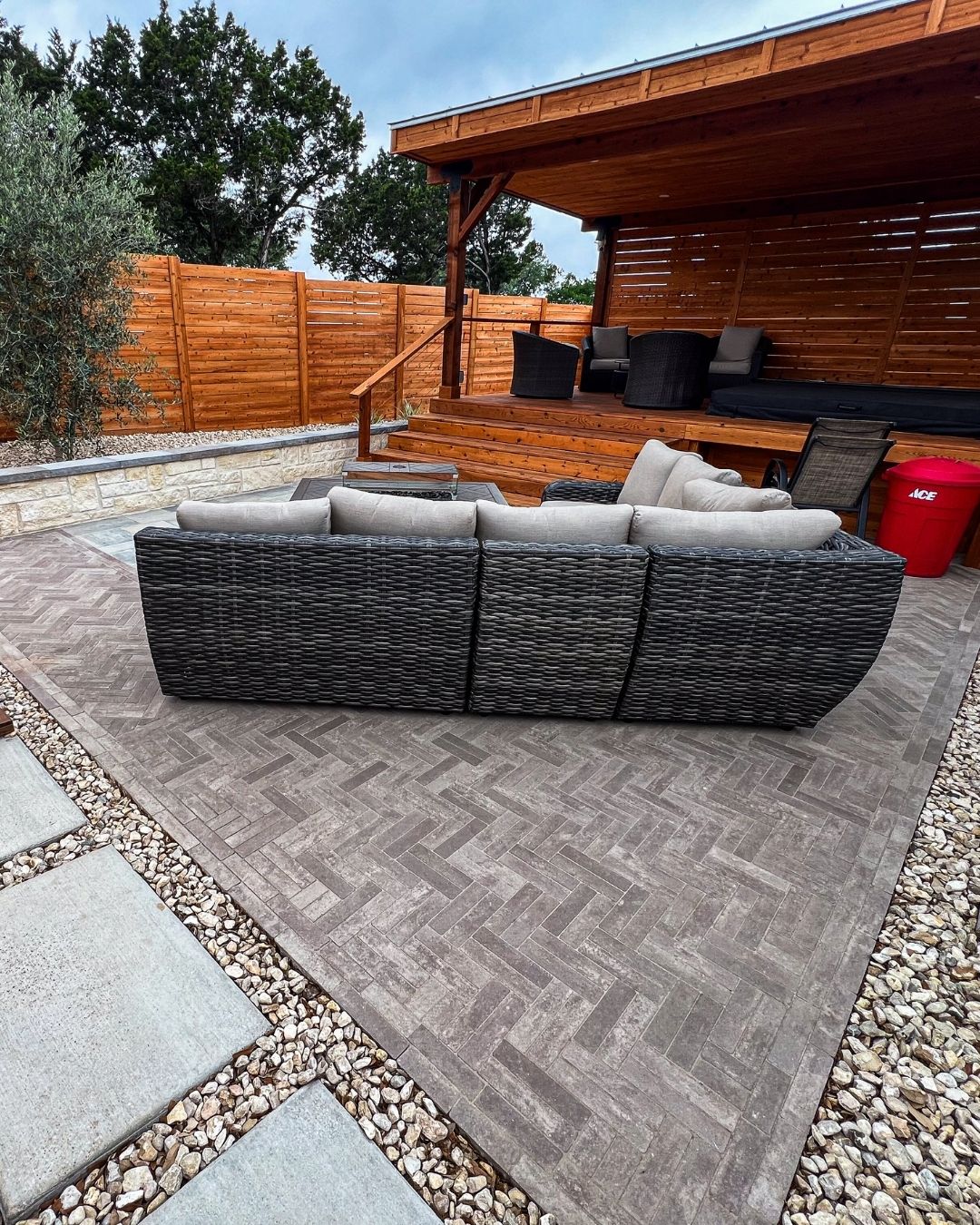 Paver patio with turf integration — San Antonio outdoor space