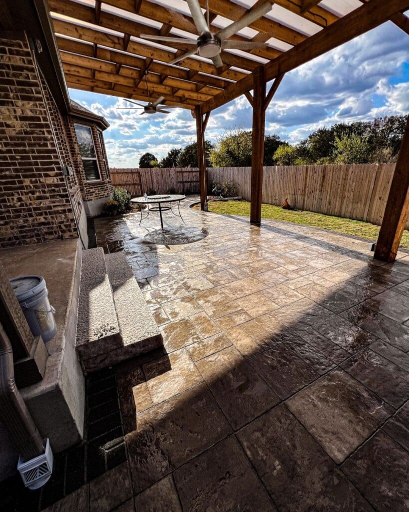 Large curved Bristol Valley paver patio in Fossil color by Vision Grounds in Bulverde TX